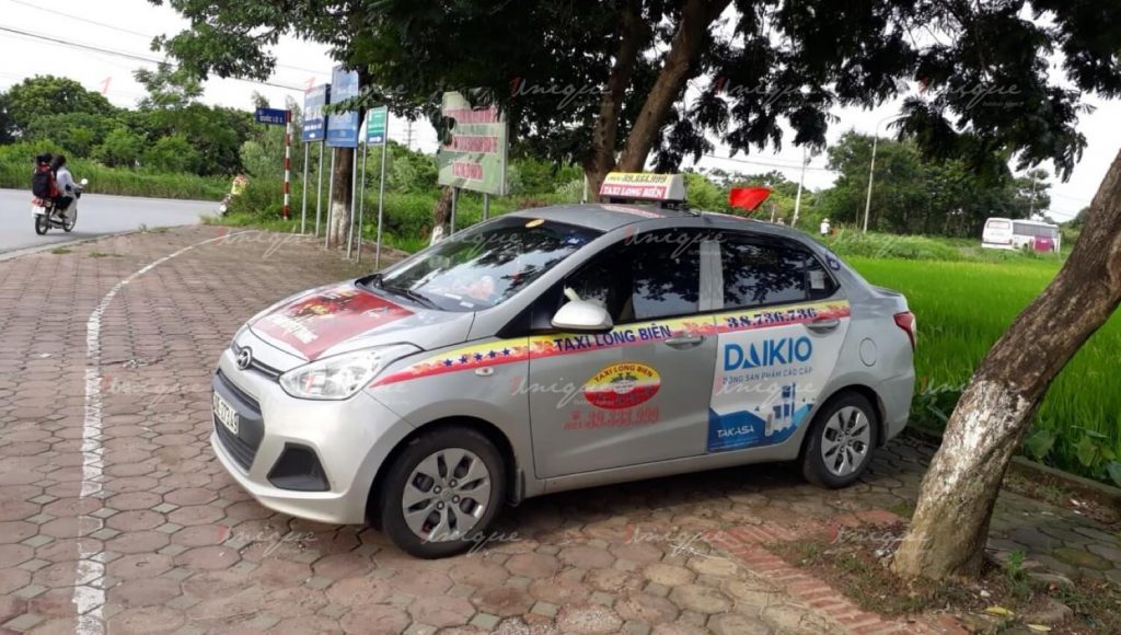 Quảng cáo trên taxi Long Biên